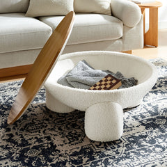 Tatvaacasa Round Upholstered Storage Coffee Table in Natural Ivory